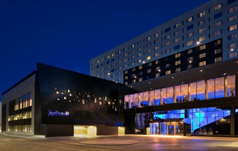 The hotel exterior, featuring the linking bridge