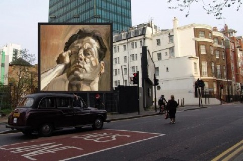 Billboard mock-up showing Lucian Freud's Mans Head (Self Portrait I), 1963 