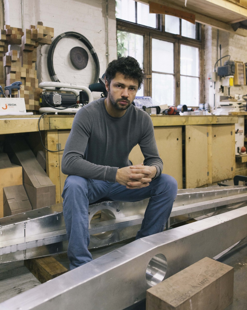 Conrad Shawcross in his studio with a fragment of Timepiece (2013)