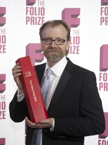 George Saunders collects his award last night 