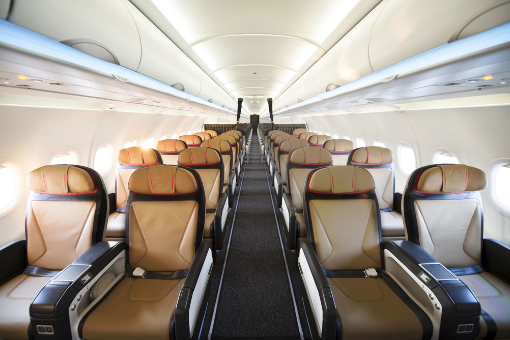 Blue light strip representing the sky runs alongside overhead bins along the length of the cabin and contrasts with the earthy tones of seats to mimick the colours of the African landscape.