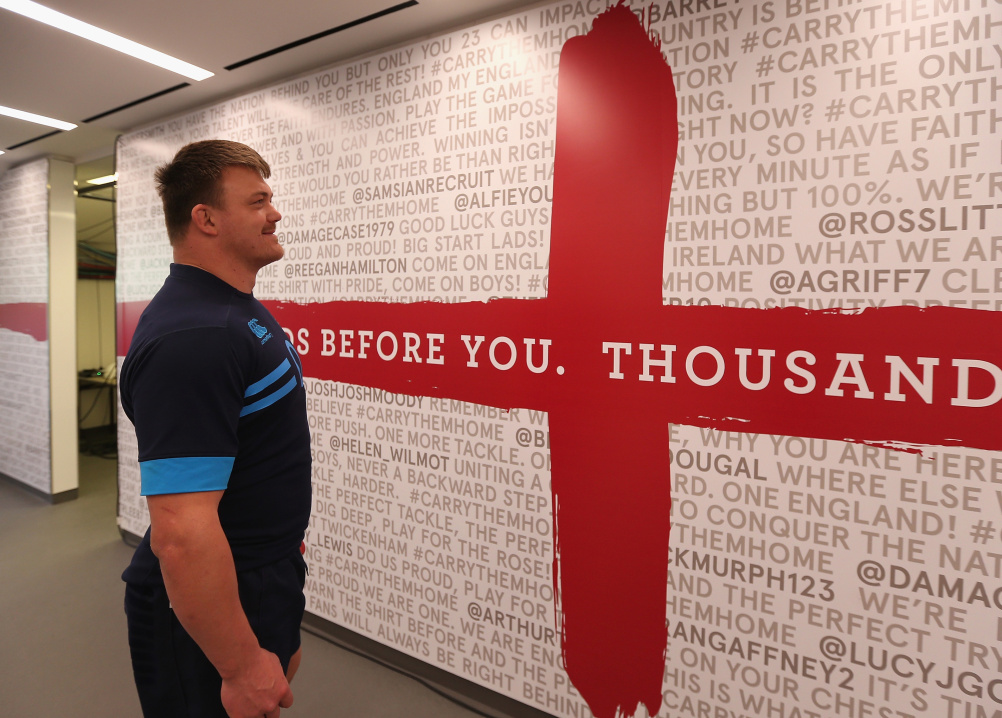 England's David Wilson reads messages of support from fans