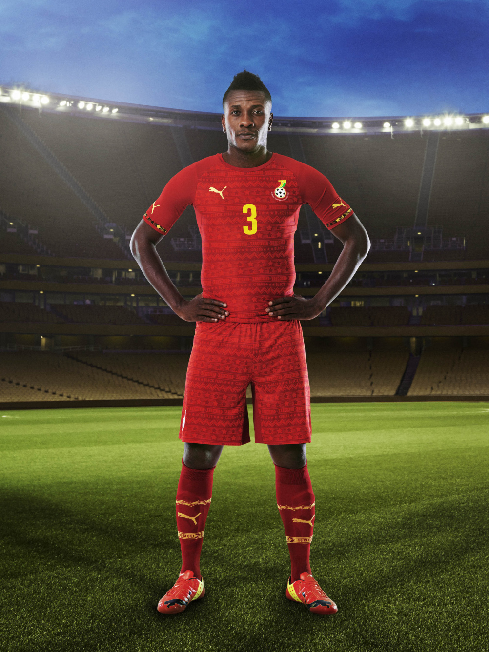 Ghana home shirt modelled by captain Asamoah Gyan