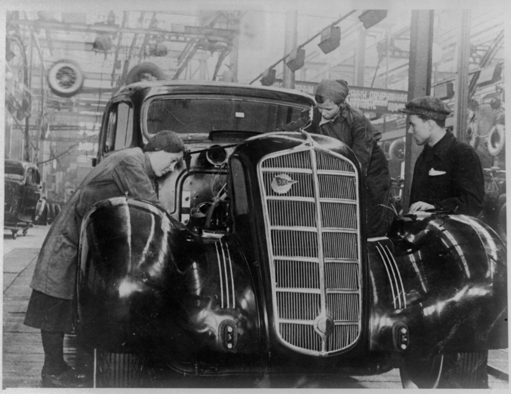 ZIL workers adding the finishing touches to a limousine, 1940s