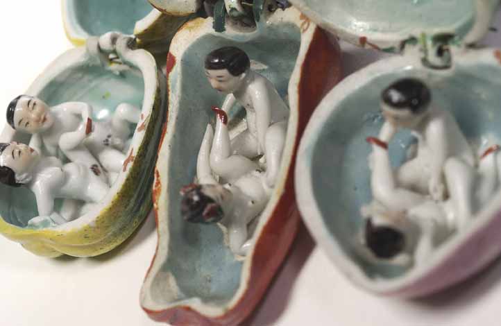 X for X-RATED: Porcelain fruit showing sexual foreplay. Acquired before 1936