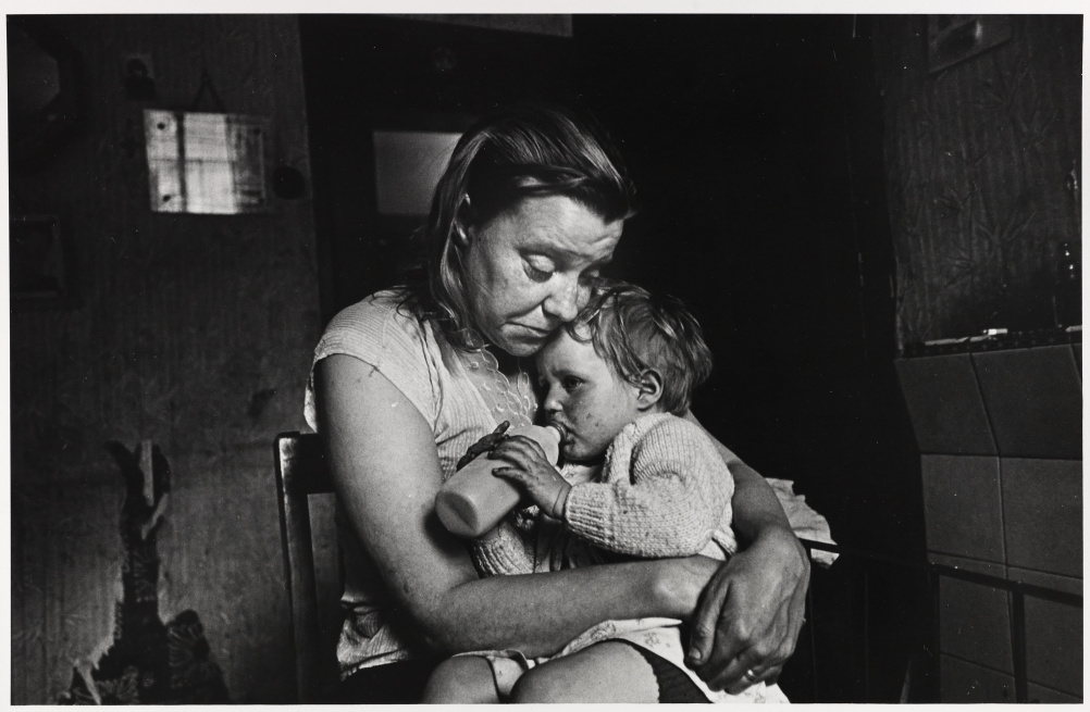 Mrs T and her family of 5 lived in a decaying terraced house owned by a steelworks. She had no gas, no electricity, no hot water, no bathroom. Her cooking was done on the fire in the living room. Sheffield, May 1969