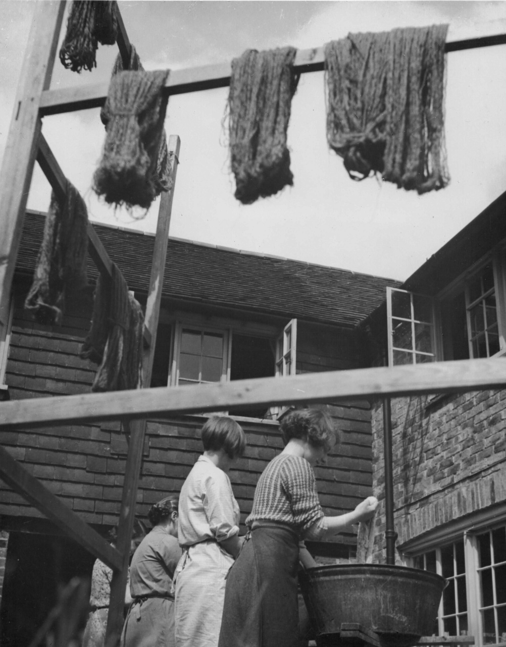  A Bold Experiment: work and play at Ditchling Guild Guild members in the weaving workshop