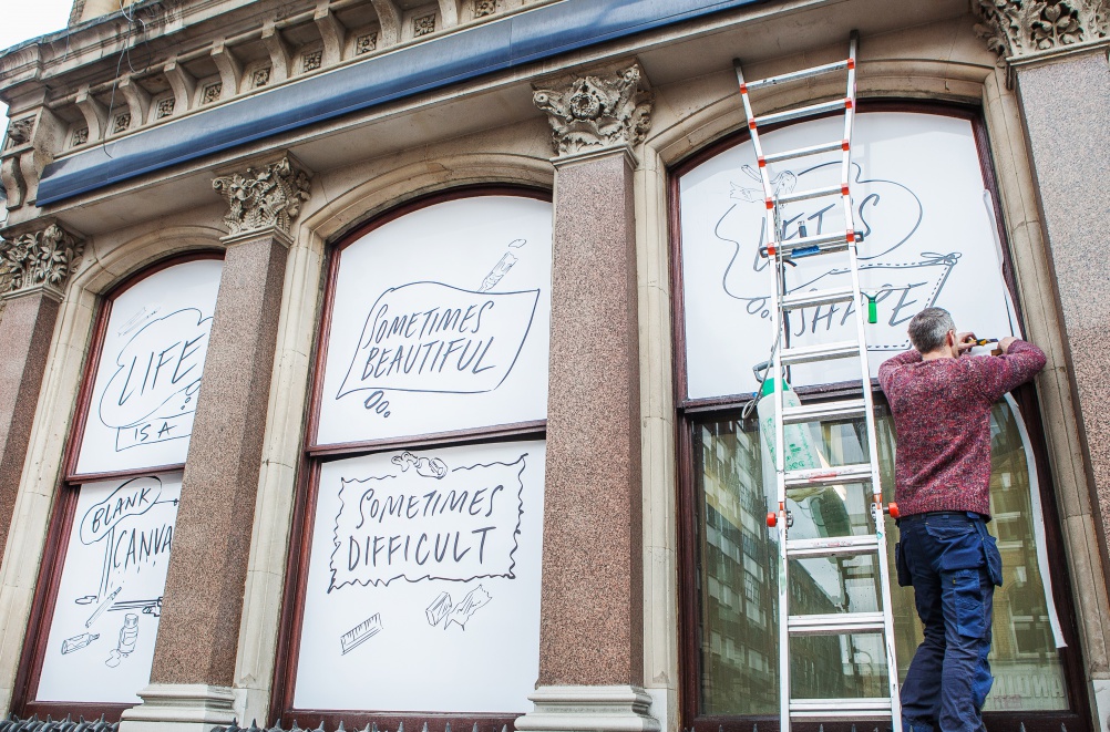 Window displays to promote the testing. Image by Philip Volkers Photography