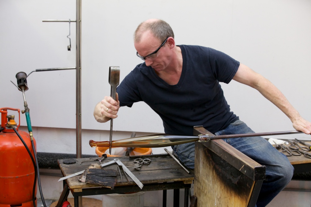 Michael Ruh in his glass-blowing studio in Tulse Hill, London