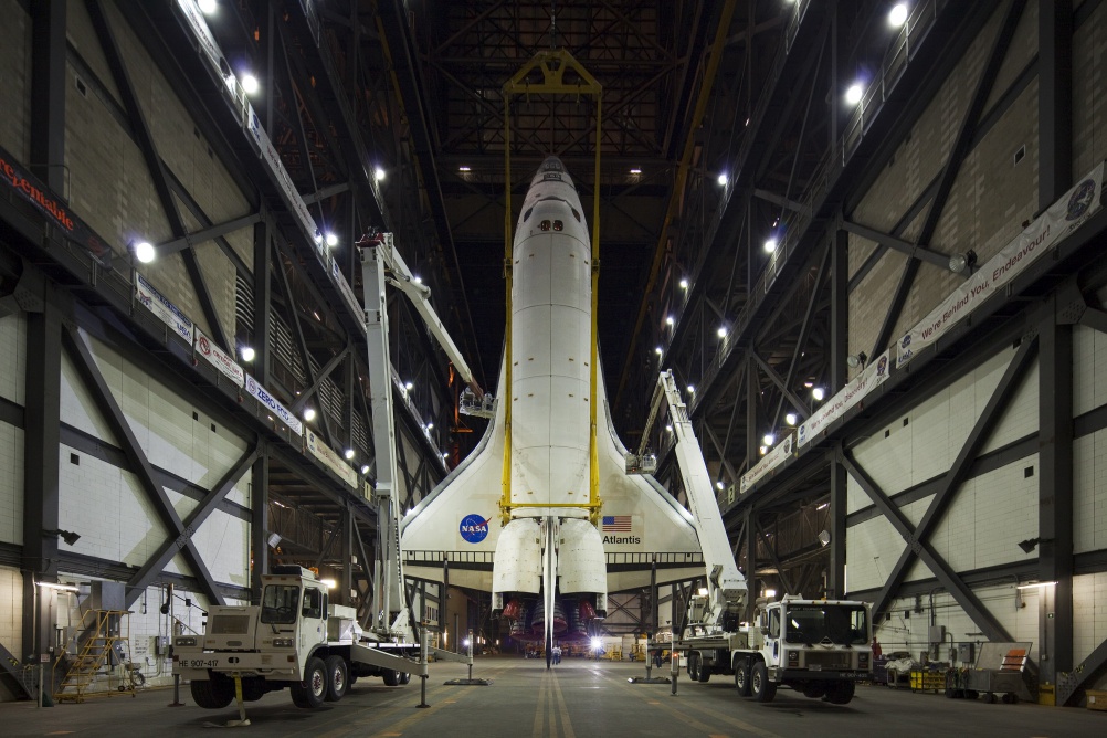 CAPE CAPAVERAL, FL - APRIL 13: Space Shuttle Atlantis hangs suspended from a sling before being mated to the external tank inside the vehicle assembly building at Kennedy Space Center on April 13, 2010 in Cape Canaveral, Florida. Atlantis is preparing for its final scheduled mission May 14. (Photo by Matt Stroshane/Getty Images)