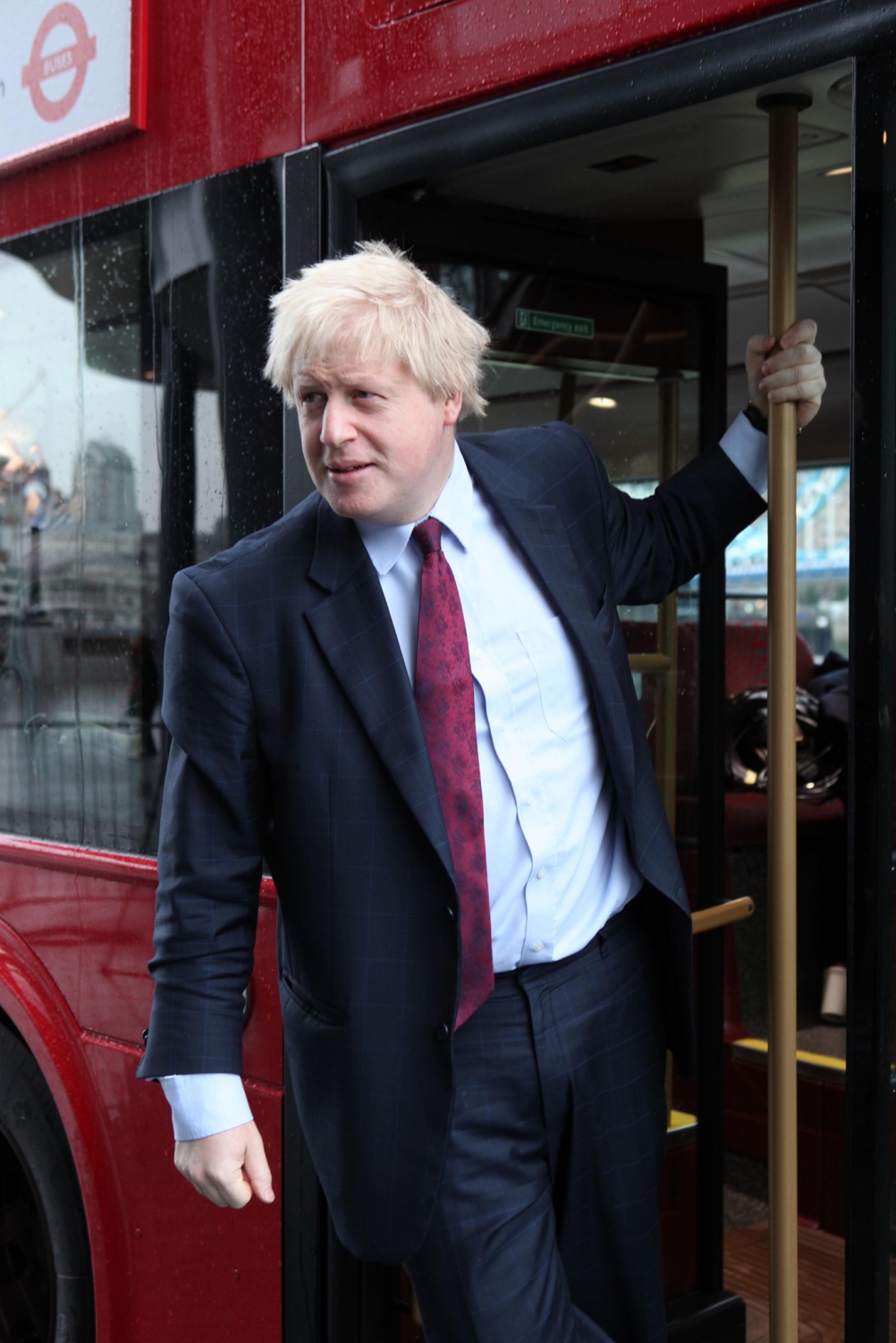 London Mayor Boris Johnson on the rear platform of the New Routemaster. Image by TfL