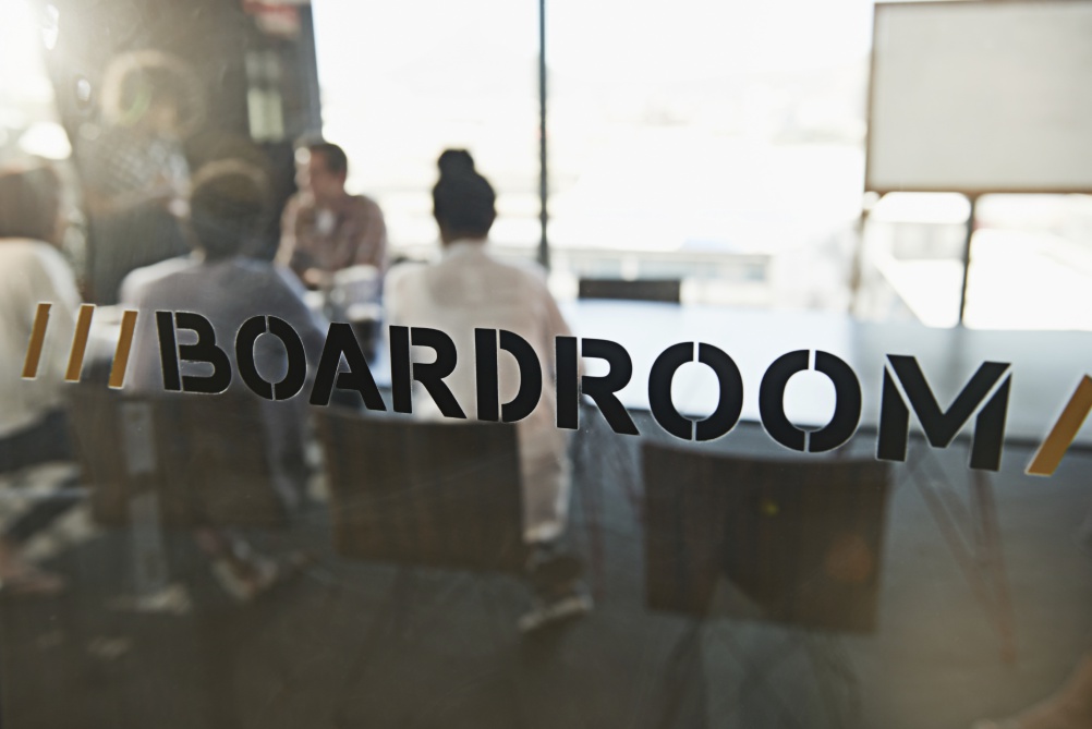 Shot of a group of young business colleagues in a boardroom meeting