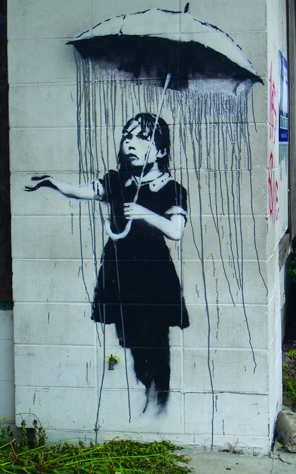 Umbrella Girl, street art by Banksy, New Orleans, USA 2008