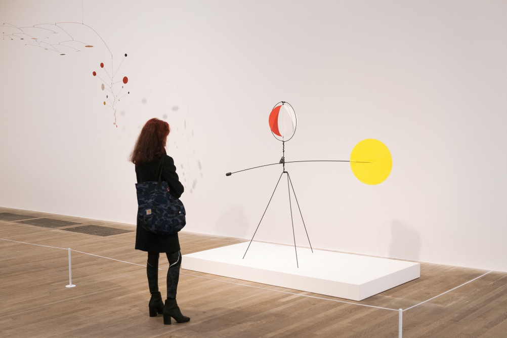 Installation view of Alexander Calder, Gamma, 1947 and Red and Yellow Vane, 1934