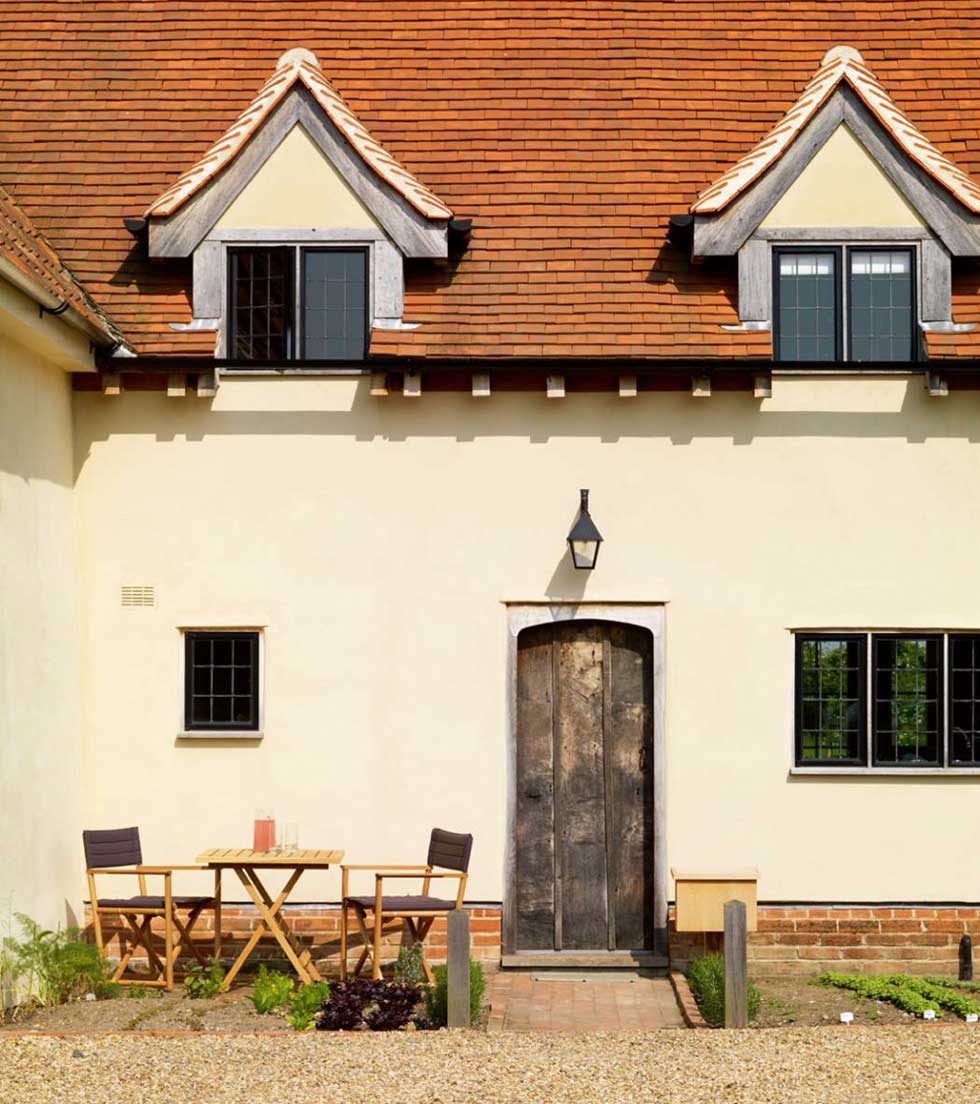 The exterior of a restored farmhouse