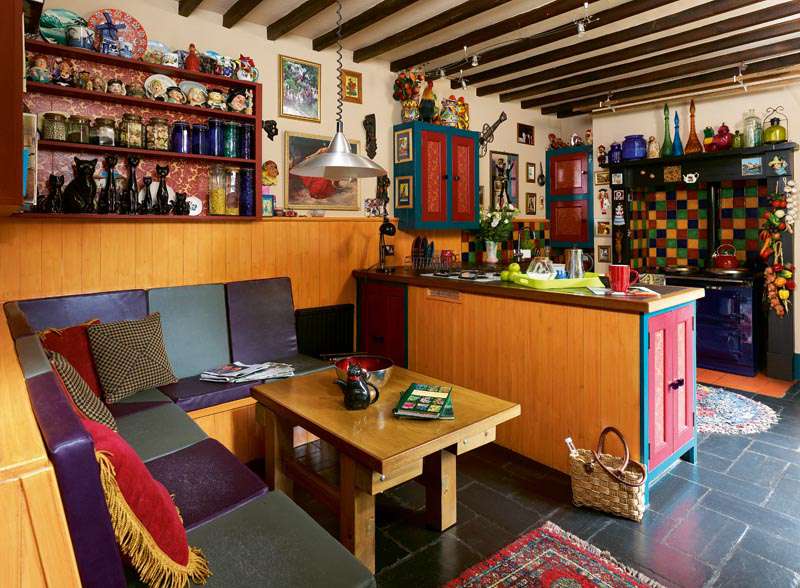 The kitchen with built-in seating for a dining area