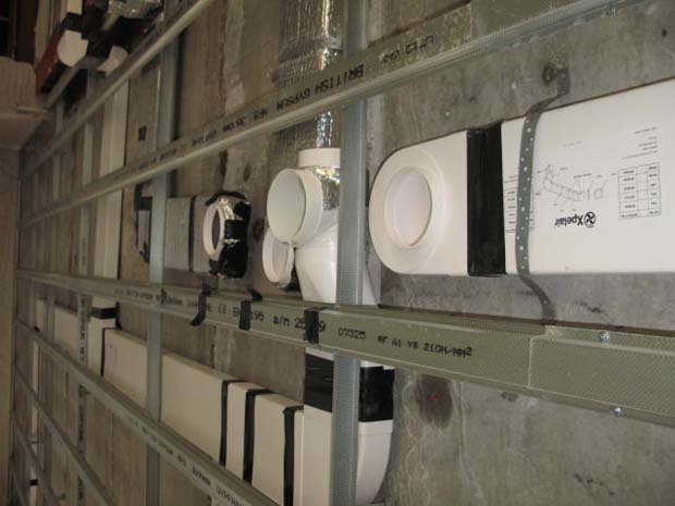 Use rigid ducting before sealing all joints with flexible ducting