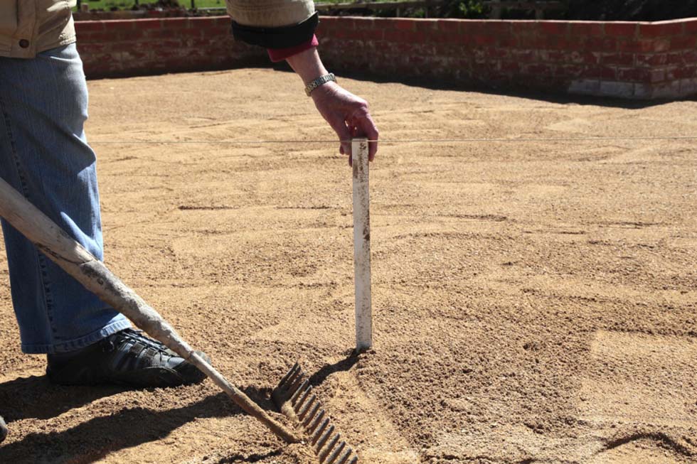 Sand is built up to about 30mm to allow for compaction...