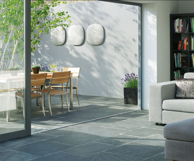 Using the same flooring throughout softens the threshold