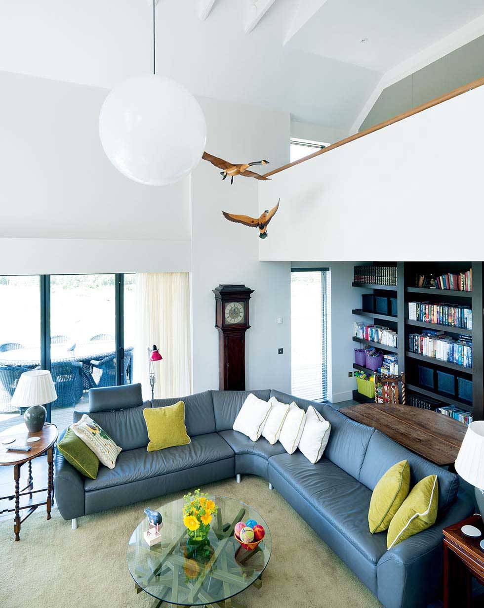 The gallery and stairs provide a visual connection between adjoining levels and spaces