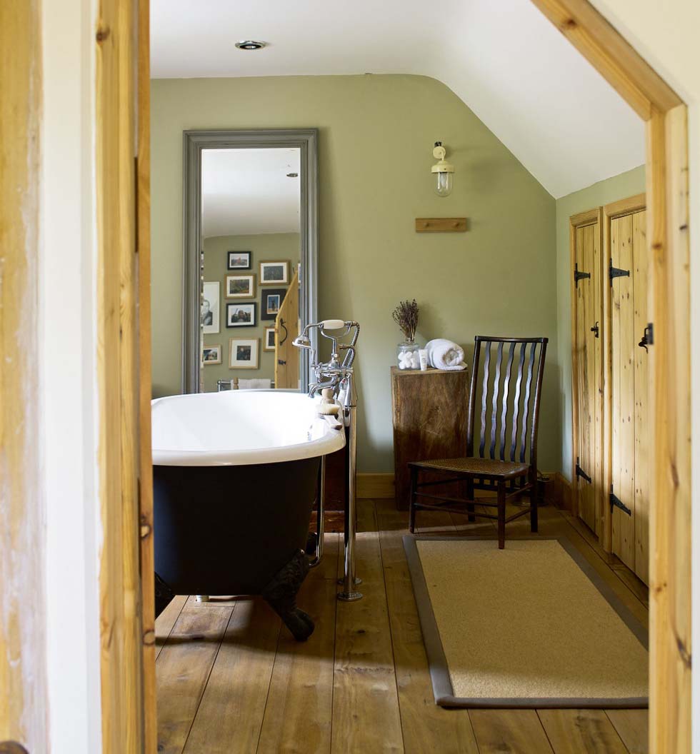 The bathroom with freestanding bath