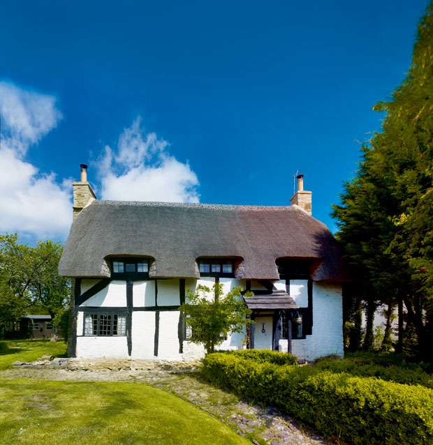 a quintessentially English thatched cottage