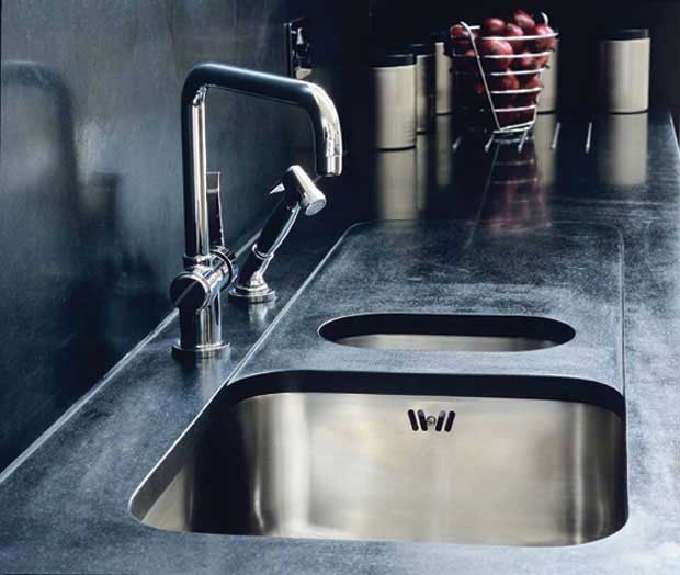 stainless steel sink teamed with black granite worktop