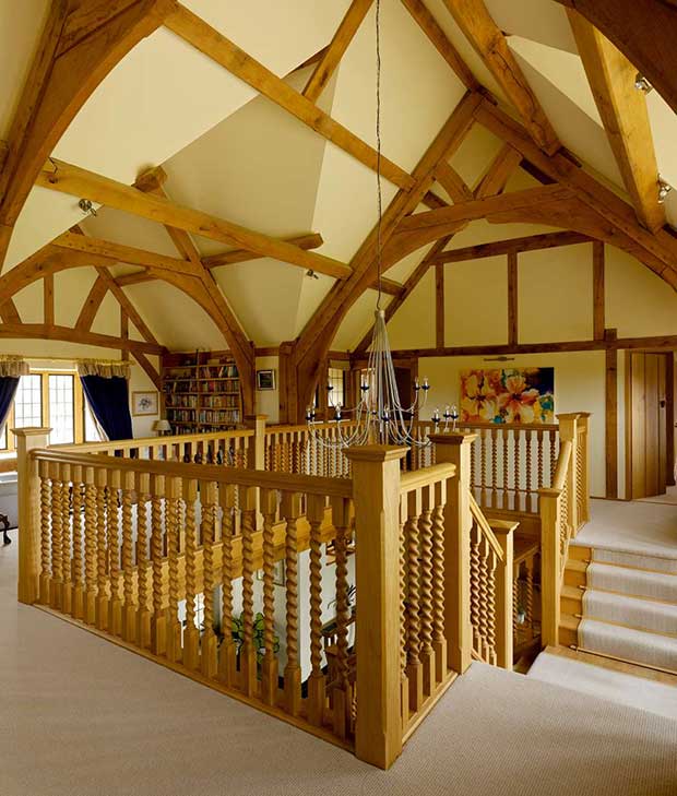 Central stairwell in oak framed country home