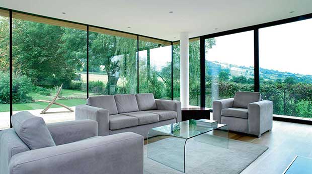 Floor to ceiling glass in a modern self build
