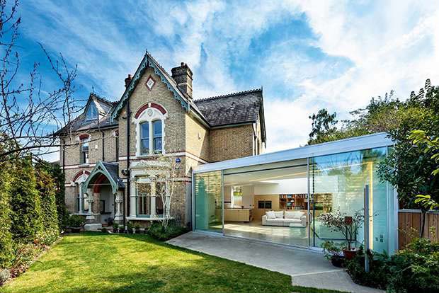Coffey Architects designed this extension to contrast with the existing home