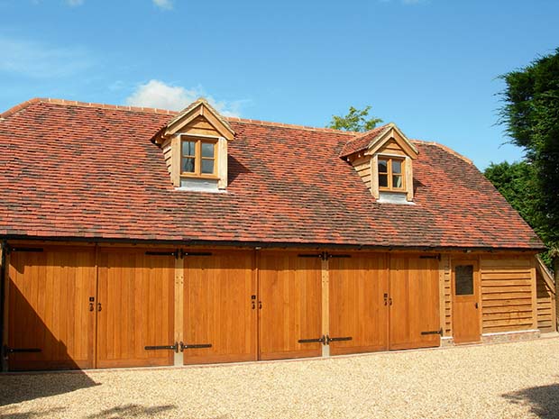 three bay Gloucester Range oak frame garage by Oakwrights