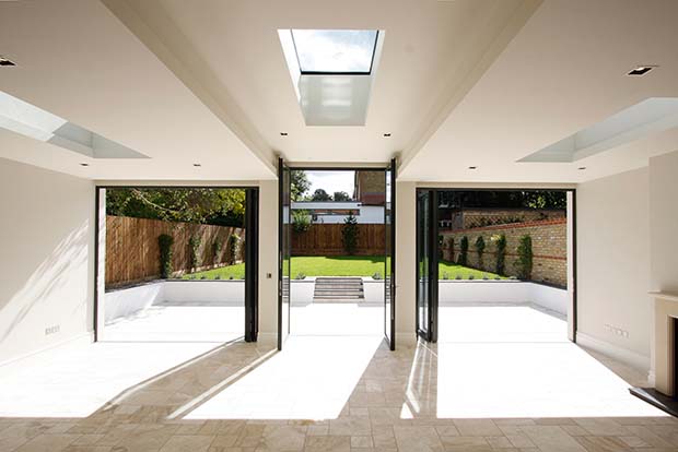 roof lights and bi-fold doors in a sunroom by IQ Glass