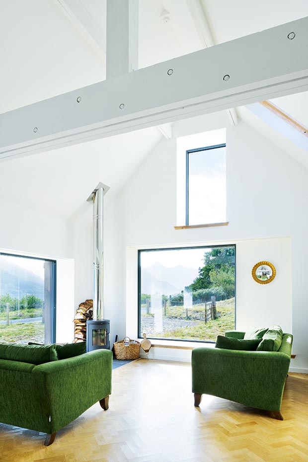 minimally framed triple glazed windows from NorDan in a Lochside self build
