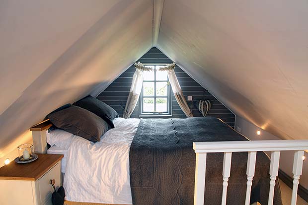 Mezzanine sleeping area to save space in the Turtledove Hideaway