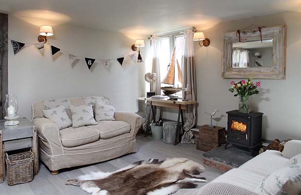 Bunting and pale vintage interiors in Turtledove Hideaway in Whitchurch Shropshire