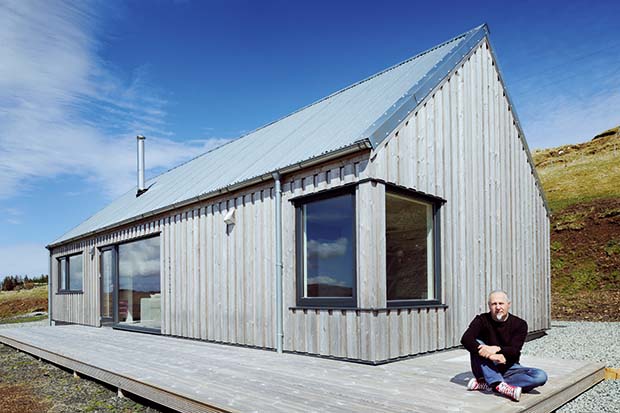 Nigel Rigden outside his self build modern holiday croft on the Isle of Skye