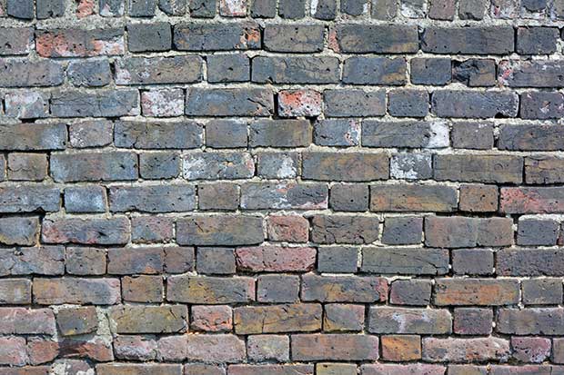 a wall in need of repointing repair work