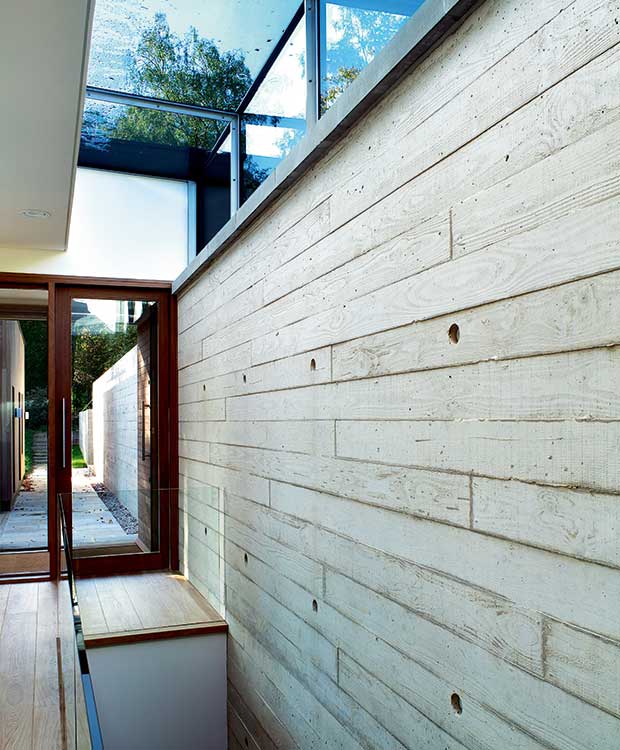 In-situ concrete wall cast in a timber frame