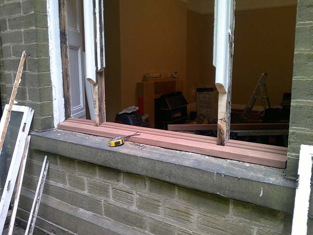 repairing the window frame and cill