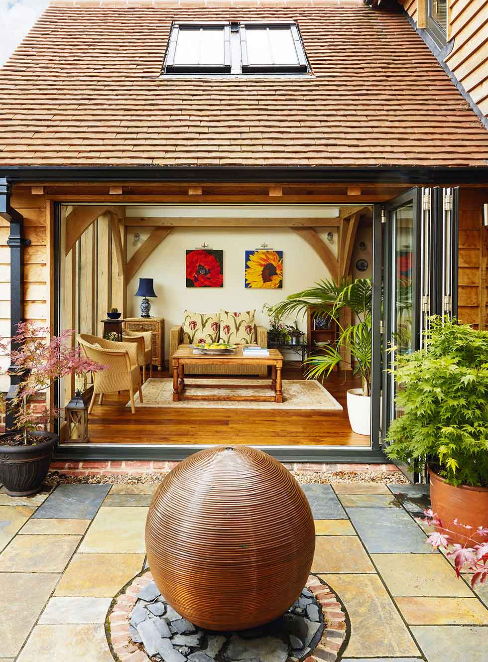 The garden room looking out onto a water feature