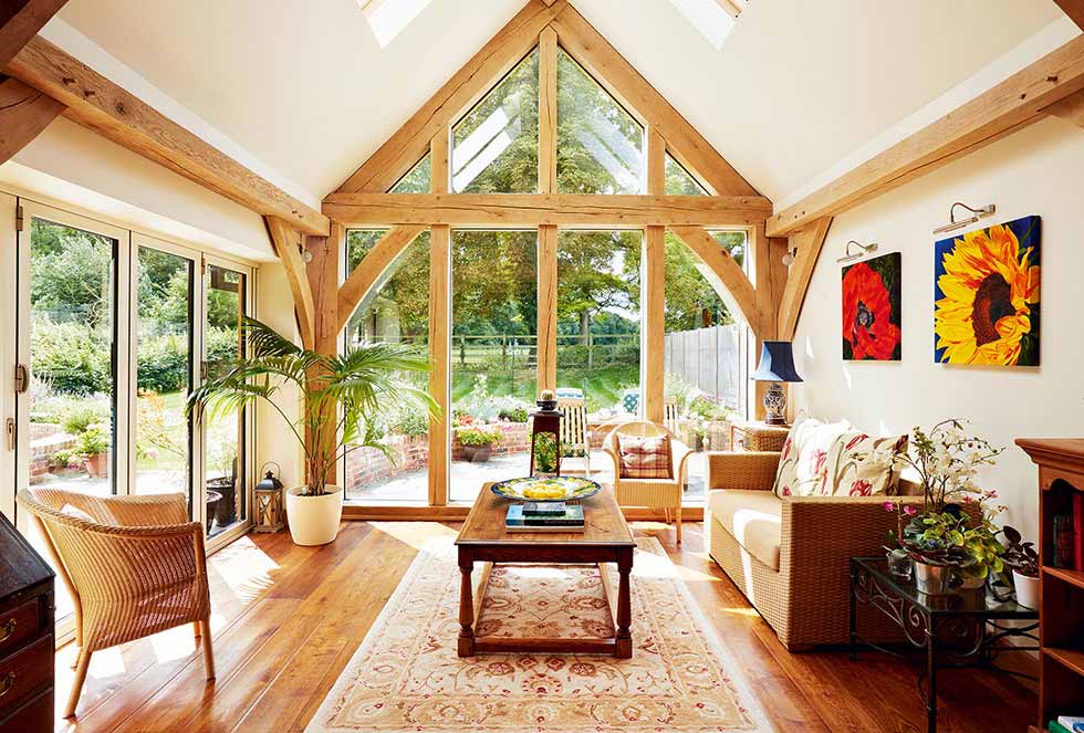 Rooflights in the vaulted ceiling and a glazed gable end ensure lots of natural light floods into the dayroom