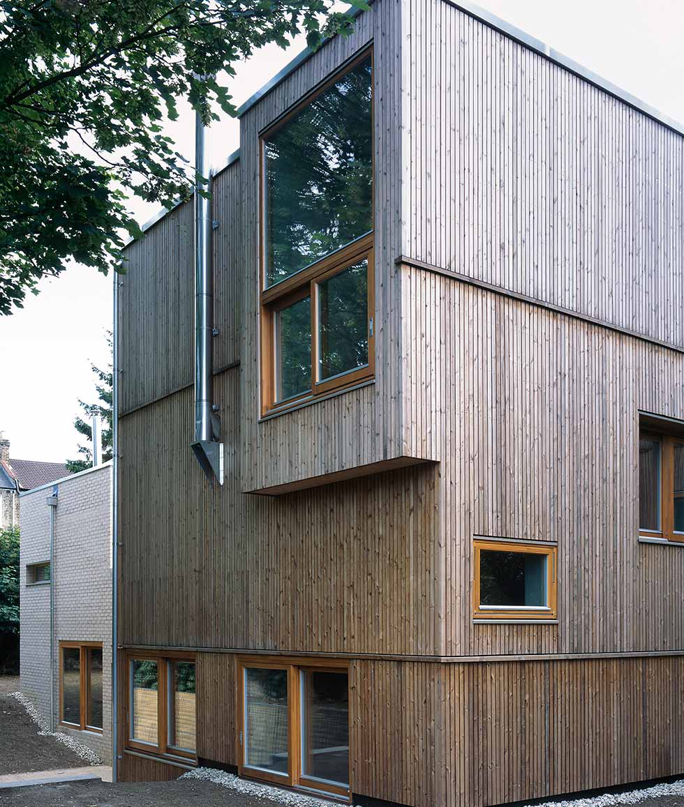 Wienerberger’s Pearl Grey bricks mix with vertical timber boarding