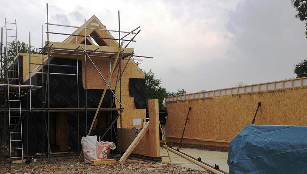 S-garage wall erected and house covered with breathable membrane
