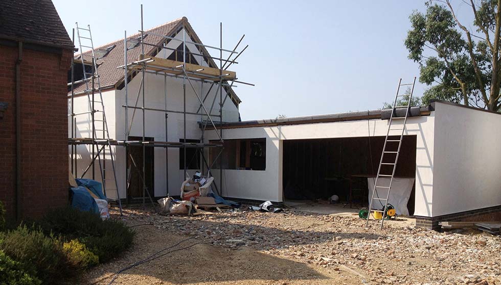 SIPs house rendered in lime