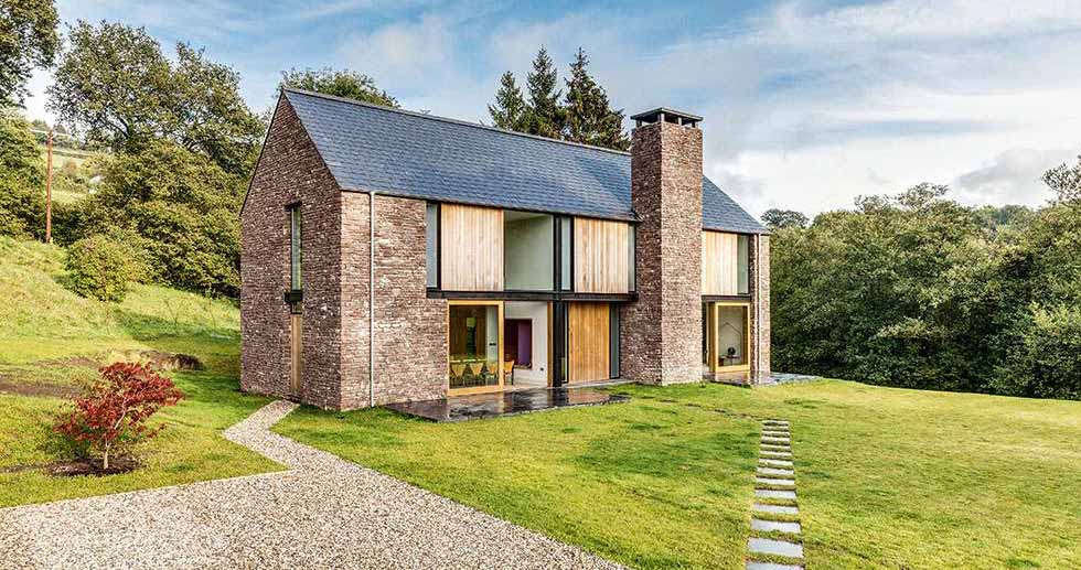 Barn-style stone home self build budget