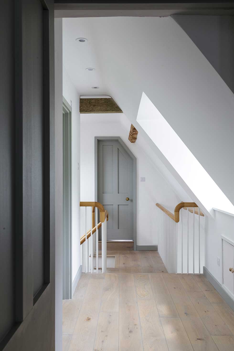 renovated listed cottage grey corridor