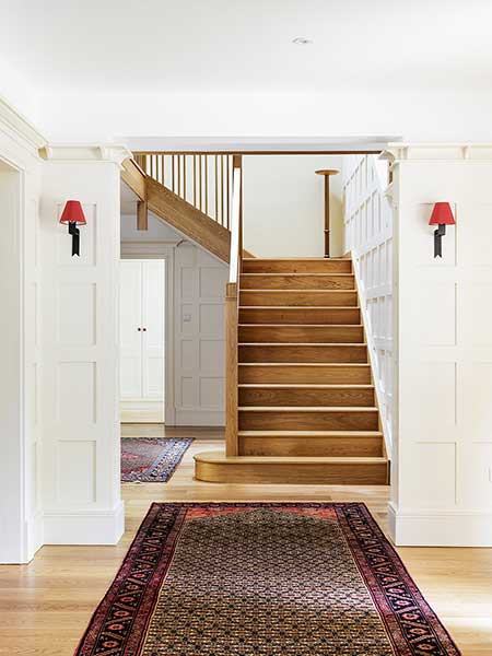 arts & crafts style self build house wood staircase entrance