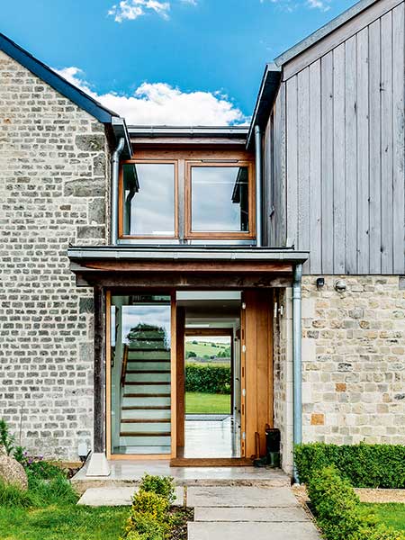 Old cottage extension glazed link staircase exterior