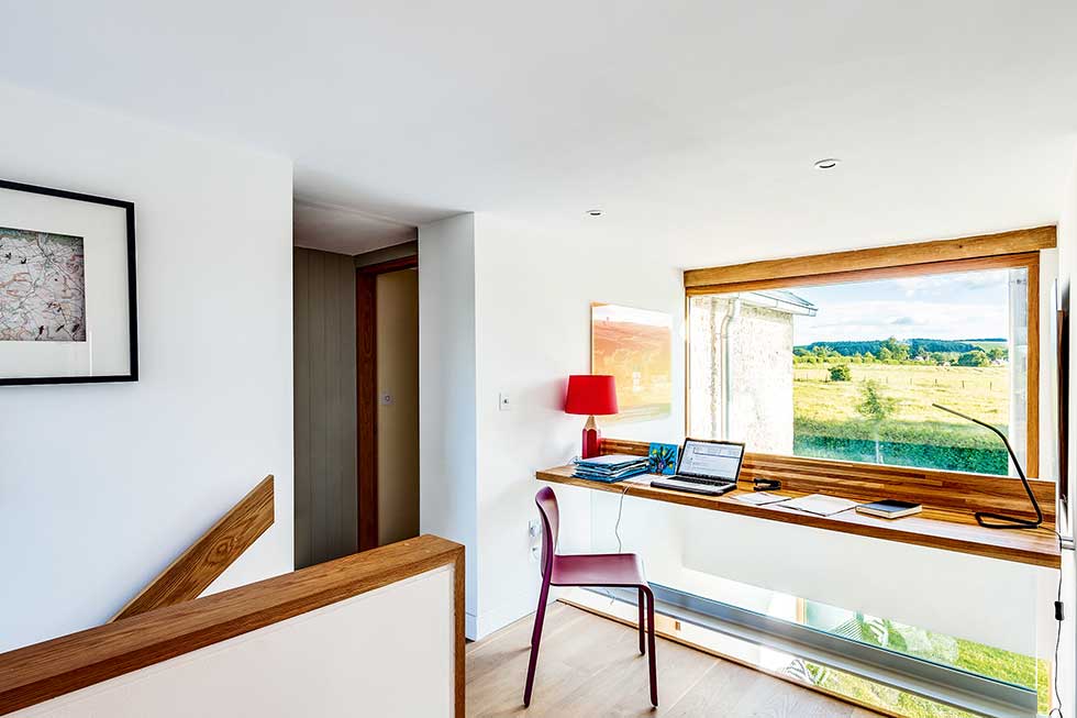 Old cottage extension home office in hallway stairs