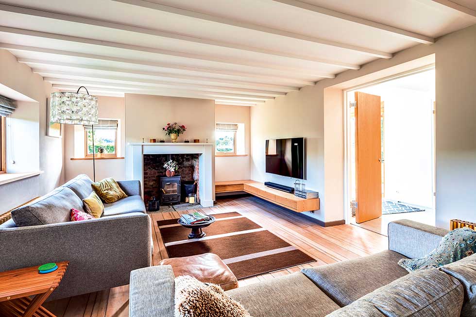 Old cottage extension cosy living room fireplace